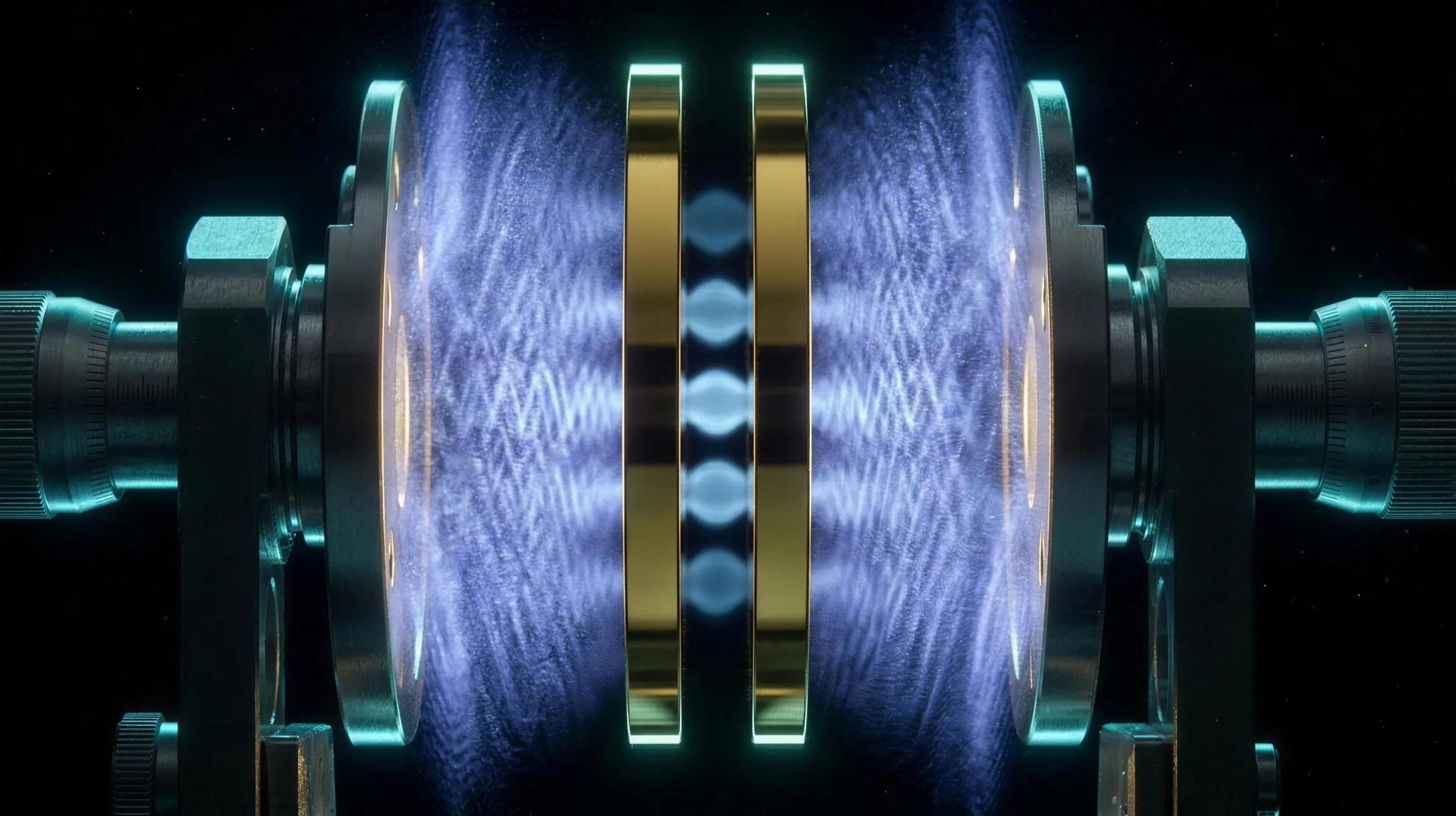An extreme macro view inside a dark vacuum chamber: two polished gold mirror plates mounted face to face on steel micrometer fixtures, a hair-thin gap between them crossed by a few faint, evenly spaced ice-blue standing waves, while the vacuum outside the plates shimmers with a dense haze of blue-violet ripples of every wavelength, cold teal rim light tracing the steel mounts and gold edges against a deep black background.